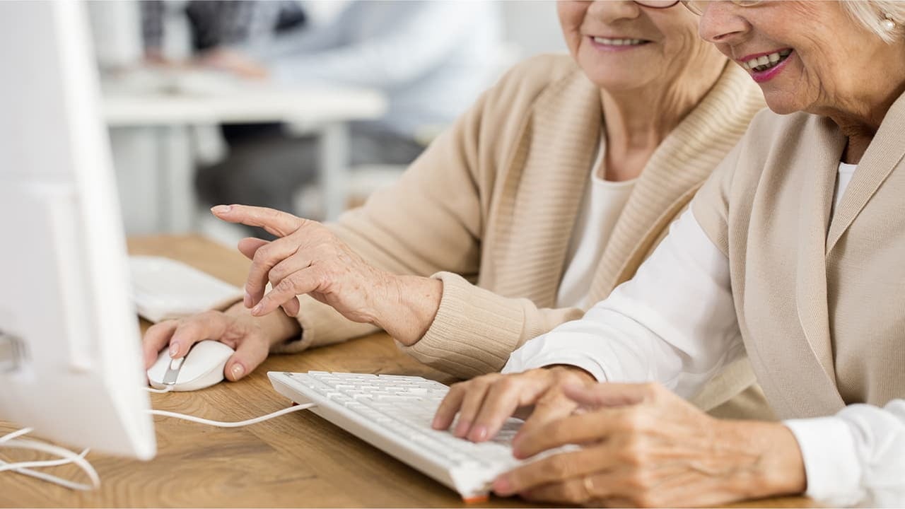 senior female friends on stationary