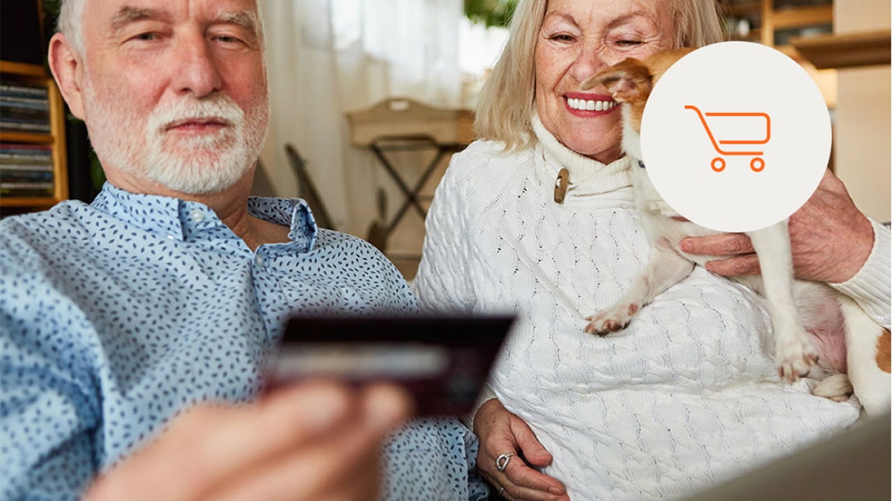 man and woman looking at phone