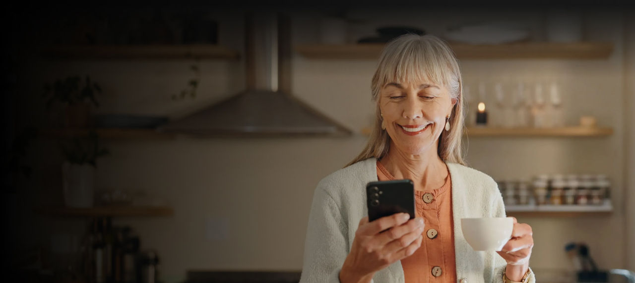 senior woman with phone in hand