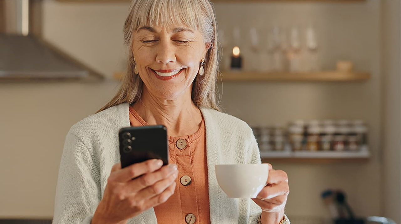 senior woman with phone in hand