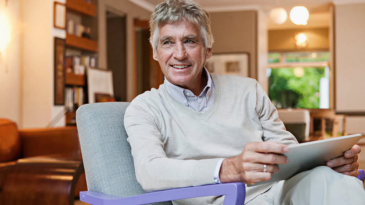 senior man with tablet